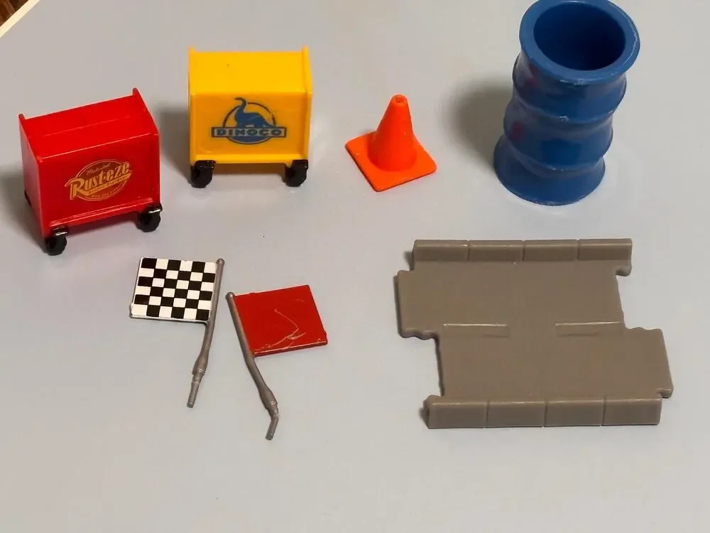 Lot of 7 Disney Pixar Cars Accessories Cones Tool Box Road Tires Dinoco Rust-eze